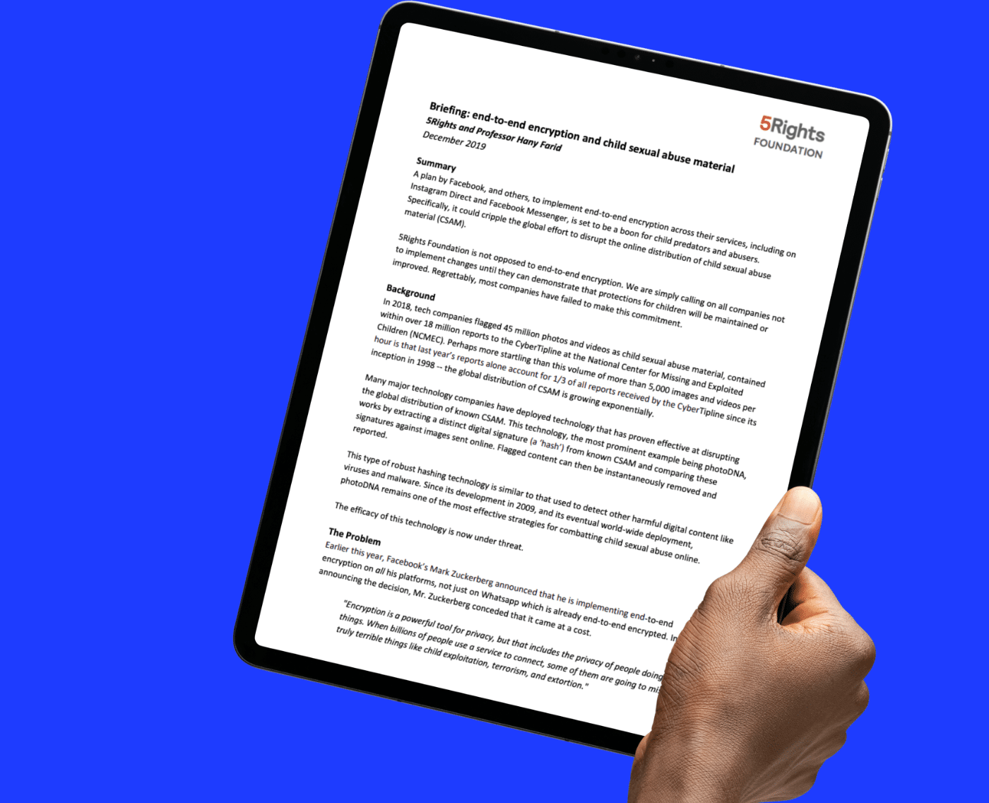A hand is holding a tablet displaying a document titled "Briefing: End-to-End Encryption and Child Sexual Abuse Material" by 5Rights Foundation and Professor Hany Farid, dated December 2019. The text outlines concerns about the implementation of end-to-end encryption by major tech companies like Facebook and Instagram, and its potential to hinder efforts to combat child sexual abuse material (CSAM). The tablet is set against a bright blue background.