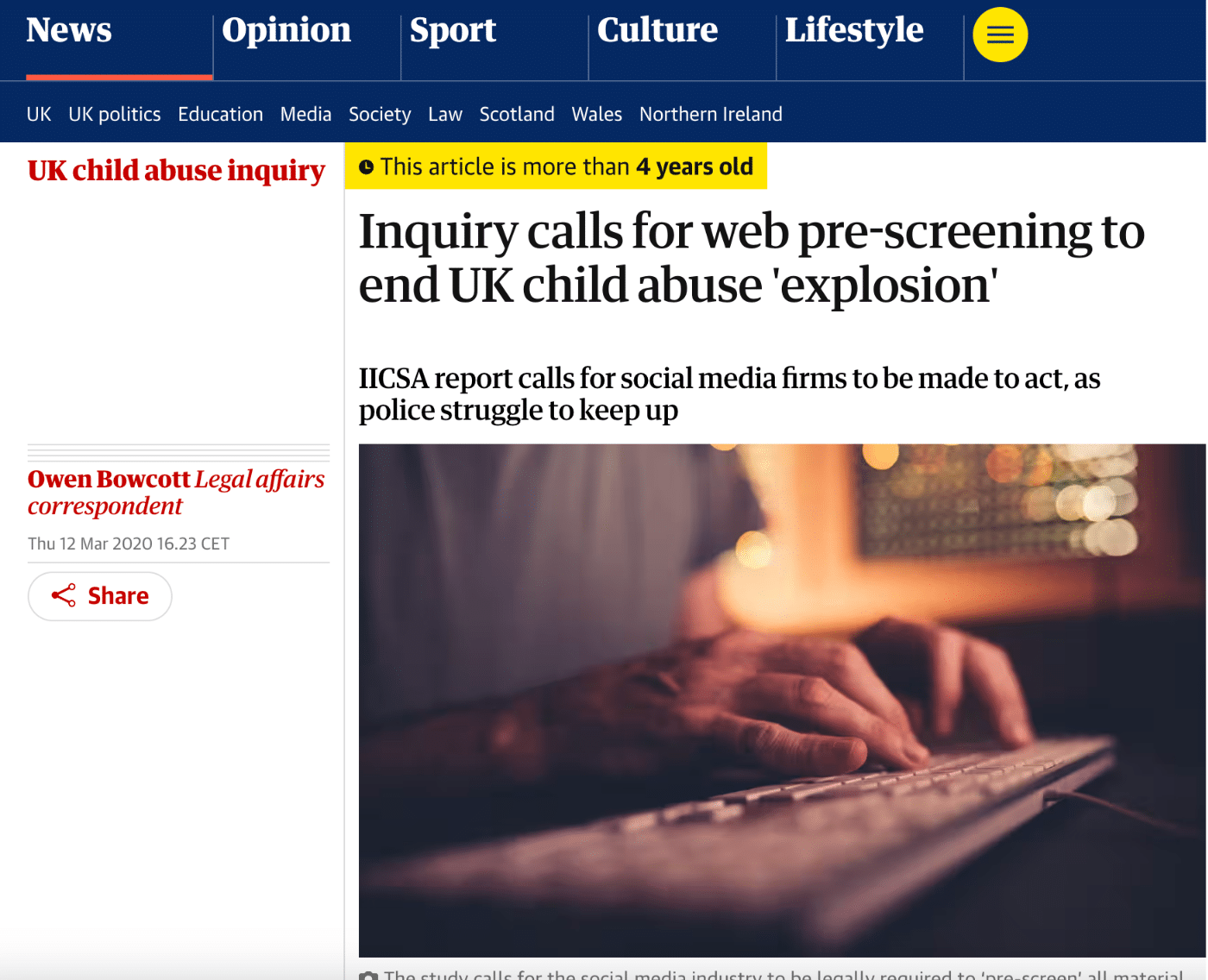 A screenshot of a news article from The Guardian titled, "Inquiry calls for web pre-screening to end UK child abuse 'explosion'." The article, written by Owen Bowcott, discusses a report from the Independent Inquiry into Child Sexual Abuse (IICSA), calling for social media companies to take action to prevent child abuse. The image below the headline shows a close-up of hands typing on a keyboard in a dimly lit room, suggesting the urgency of online monitoring. A yellow banner at the top notes that the article is more than four years old.